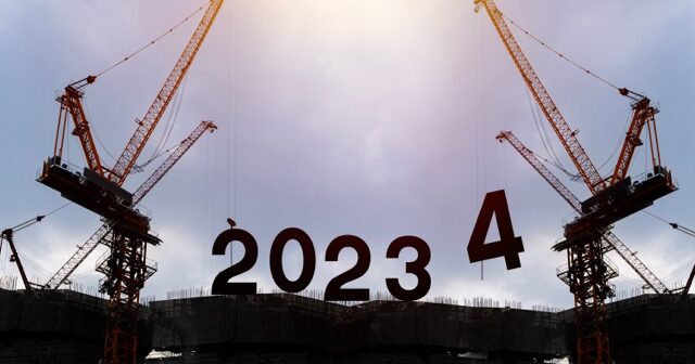 Silhouette Of Construction Worker With Crane And Cloudy Sky For Preparation Of Welcome 2024 New Year Party And Change New Business.