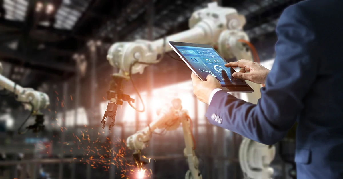 Man Controlling Construction Robots Man Controlling Construction Robots